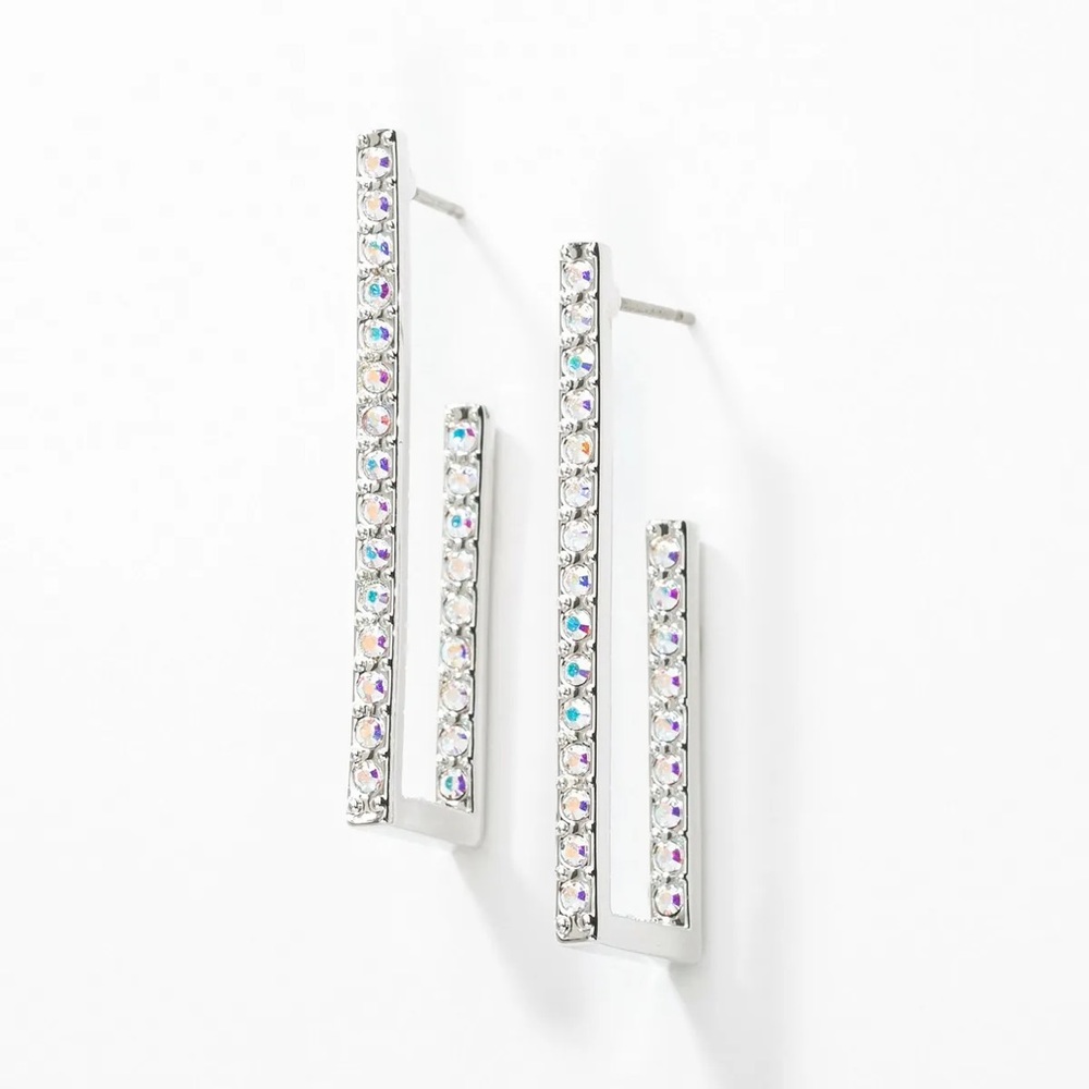 Touchstone Crystal Earrings New, display only. Comes with a box. Post, Rhodium.